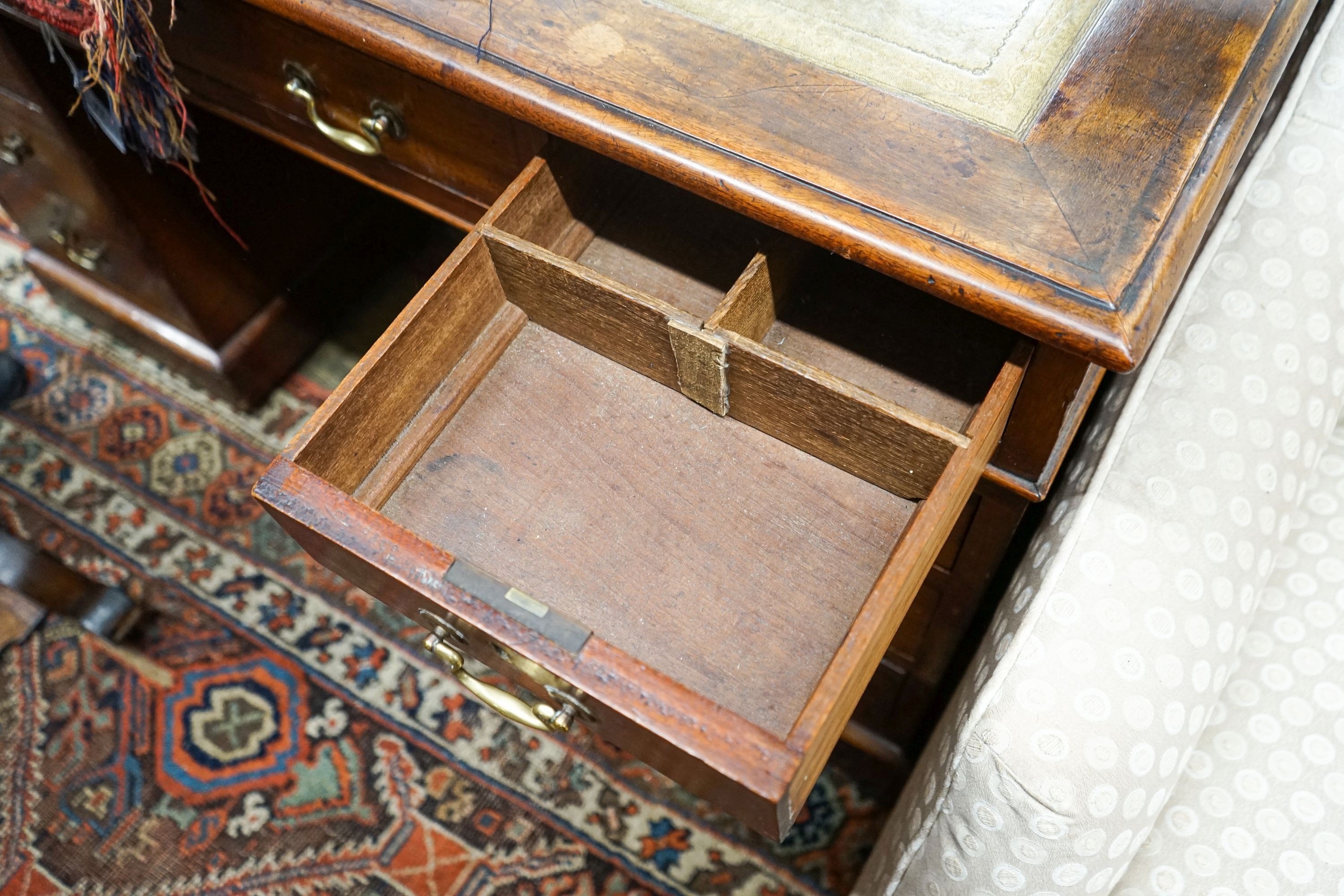 A late Victorian mahogany pedestal desk, length 122cm, depth 74cm, height 76cm